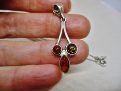 Beautiful silver necklace with real amber pendant