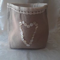 Linen storage with button heart