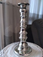 Silver colored candle holder