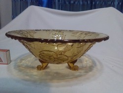 Old amber colored convex grape patterned fruit bowl on three legs