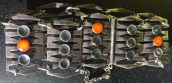 Modernist- 1970s silver-plated metal bracelet with tiny amber