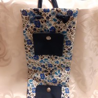 Blue floral textile hanging jewelry holder
