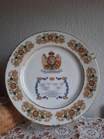 Aynsley English porcelain wall plate with a family tree of female members of the royal family.