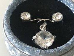 Silver plated pendant and earrings with shining crystals