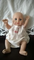 This charming doll in real baby clothes - 41 cm, hands and feet move - even as a gift!