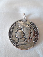 Coin pendant in silver?