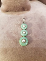 Silver pendant with jade stones