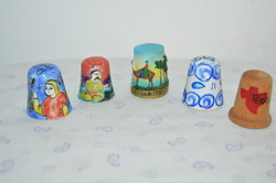From a collection of 4 mixed pattern ceramic thimbles