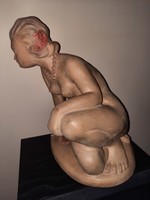 Terracotta statue of Dr.Rank Rezső sitting female nude