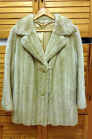 Short beige faux fur coat