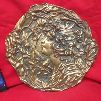 Bronze, bronzed female wall plate, wall decoration.
