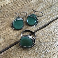 Handmade polish jewelry set decorated with green minerals