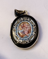 Old enamel relic pendant with amor.