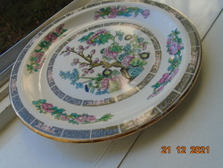 Decorative oriental flower pattern on english plate with sampsonite churchill