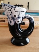 Black and white ceramic horn