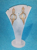 Gold colored earrings (26)