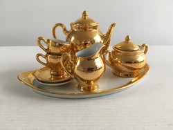 Régi, vintage aranyszínű, jelzett, porcelán baba készlet, teáskészlet, kávés készlet