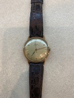 Vintage doxa anti magnetique men's watch in 14k rosegold case