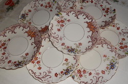 Sarreguemines faience plates with fleury decor.