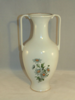 Porcelain vase with daisies