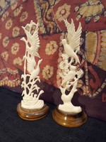 Pair of hand carved beef sculptures
