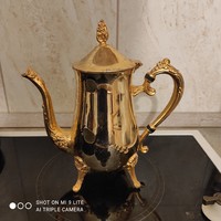 Beautiful gilded neo-baroque style coffee or tea pot