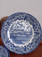 Couple with english churchill porcelain cookies on plate