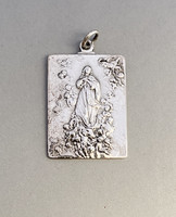 Old silver religious pendant.