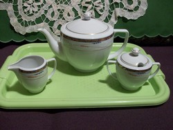 German porcelain teapot, sugar bowl and milk spout