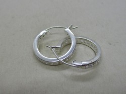 Elegant silver hoop earrings with white stones