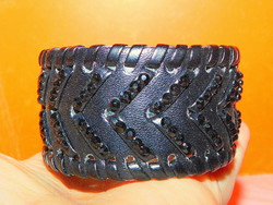 Braided handmade bracelet in the form of a night black crystal leather