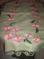 Beautiful elegant spring handmade woven handicraft tablecloth with crocheted embroidery