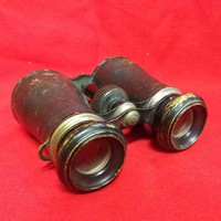 Old leather-coated copper theater binoculars, binoculars.