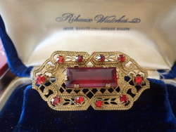Antique filigree brooch with red stones