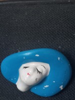 Women's head badge with a special porcelain hat from the 1980s