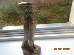 Horus is an Egyptian falcon god carved from heavy onyx semi-precious stones.