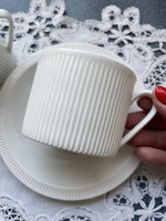 Snow-white arzberg bone china ribbed cappuccino cups with pouring