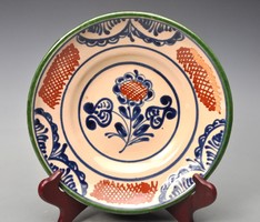 Wall plate with Transylvanian (homosexual or Romanesque village) motifs, made in the 1960s.
