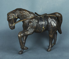Leather-covered horse, statue
