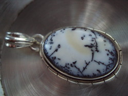 Silver pendant with merlinite / dentritic opal /