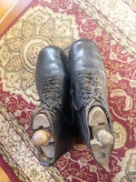 Pair of vintage antique ski boots