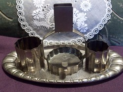 Silver plated antique cigarette holder set on tray