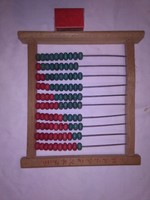Old wooden ball abacus with calculator