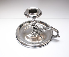Ornate old silver-plated handmade candle holder.