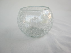 A small vase of cracked glass