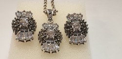 Silver necklace richly decorated with stones, pendant and earrings