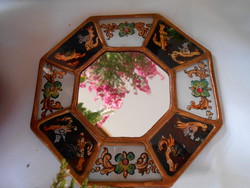 Chinese octagonal small wall mirror.