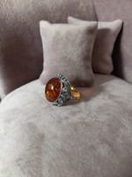 Antique silver ring with polish amber