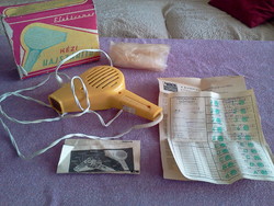 Retro hair dryer with original papers