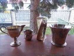 4 antique prima niggers and a heavy silver twisted vase weighing 682 grams